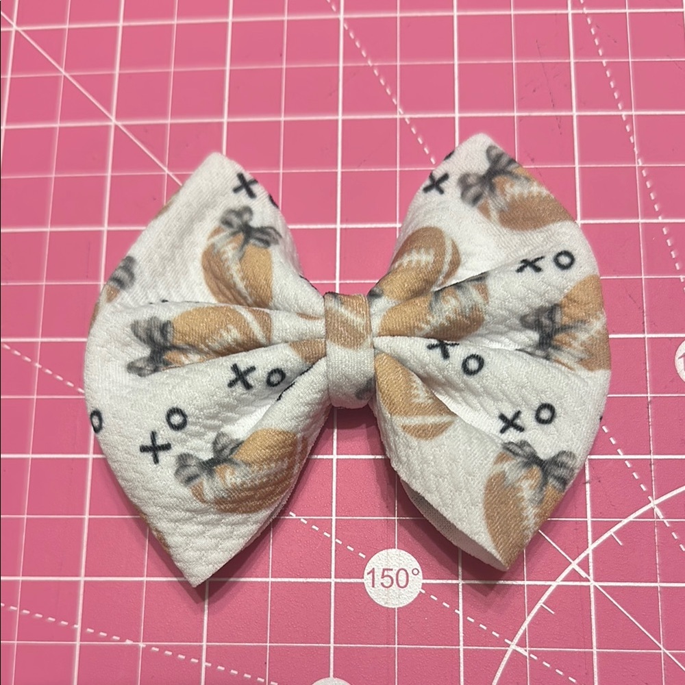 Adorable White and Brown Football Bow for Kids